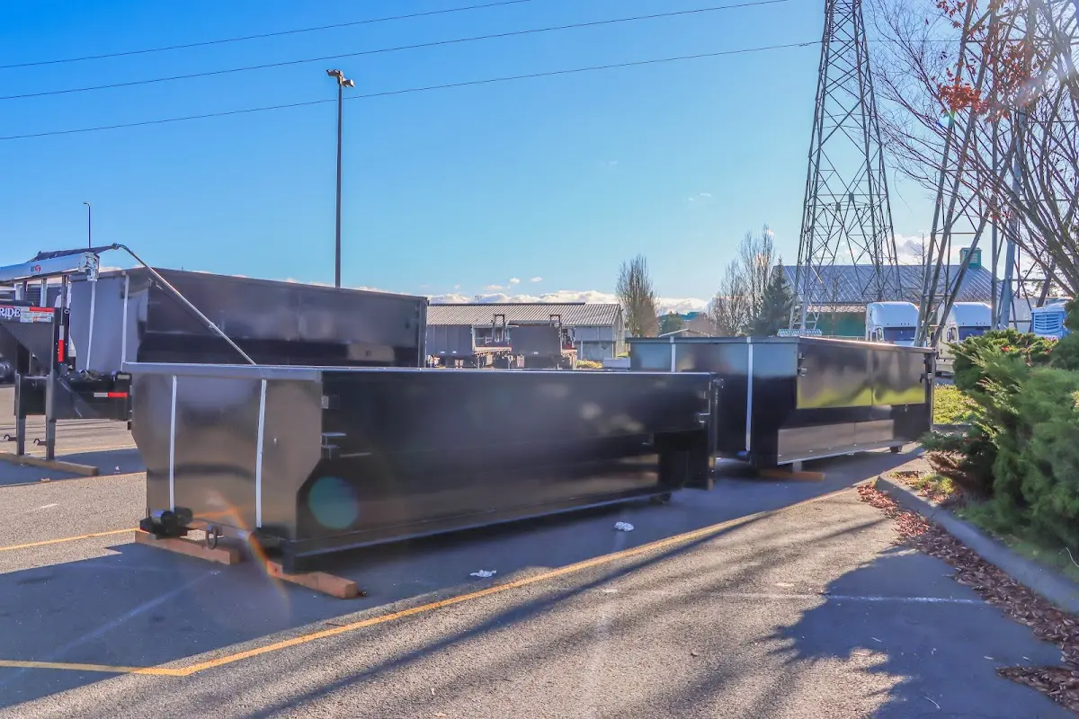 Roll-off dumpster ready for waste disposal at job site for Concrete Dumpster Rental in Groveland